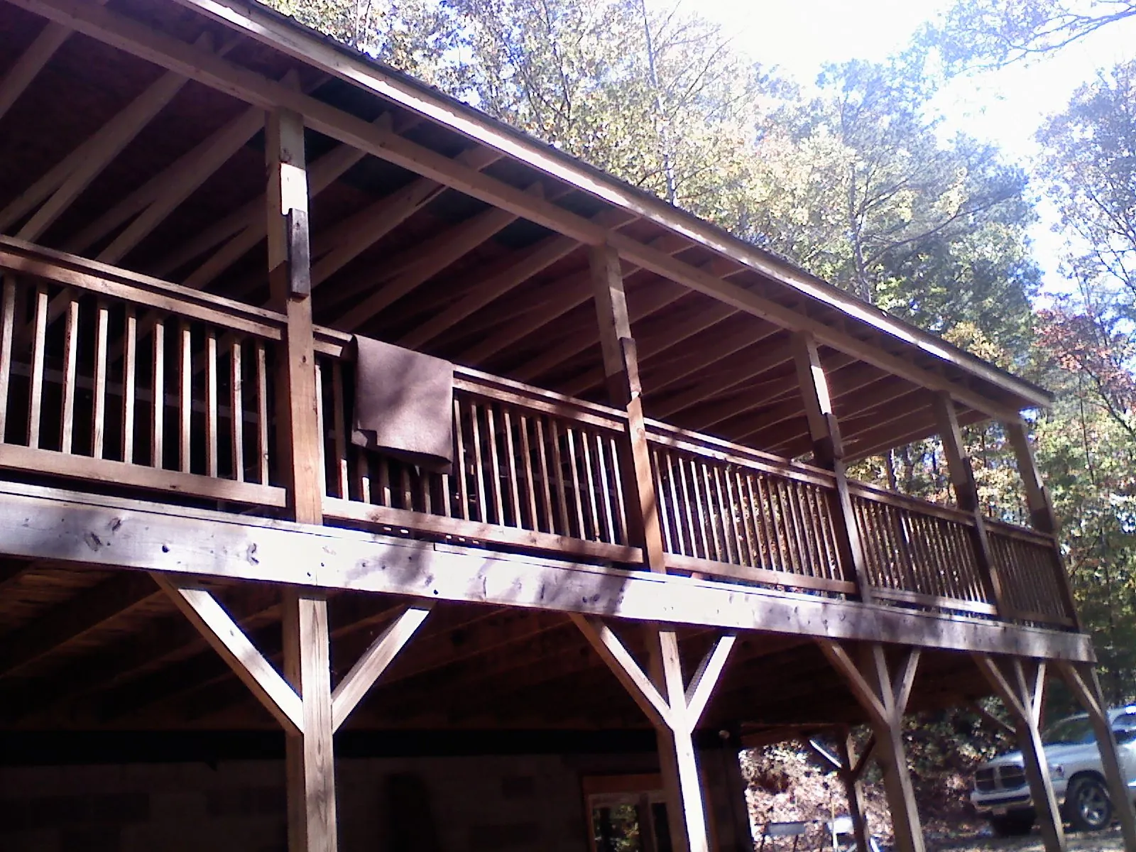 Timber framing under a new elevated porch and deck — Roof Leak Repair in Lookout Mountain by Roofing Brothers